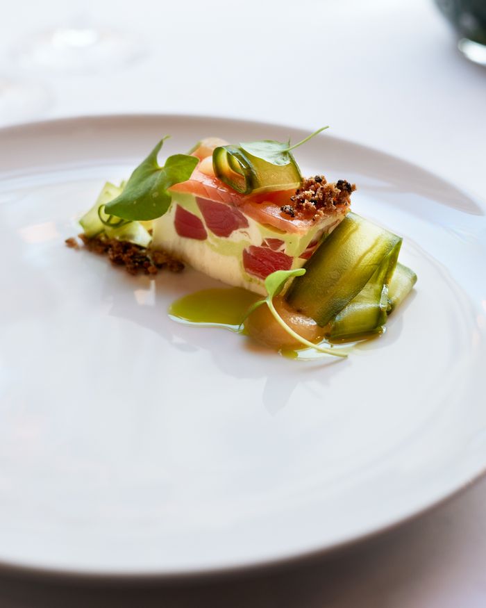 services-img Delicate gourmet dish featuring fresh vegetables and garnishes, perfect for fine dining inspiration.